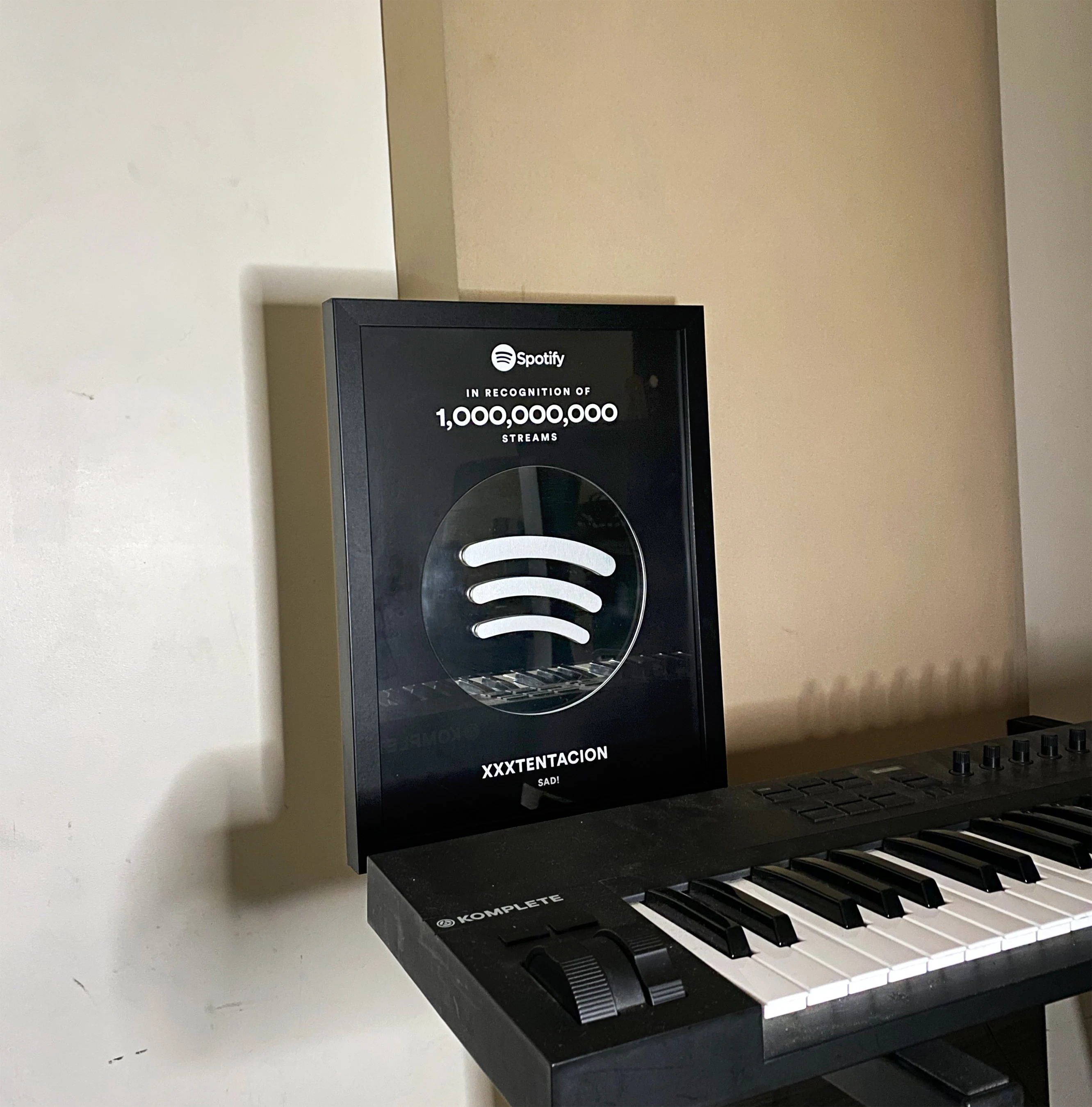 Artist celebrating streams milestone