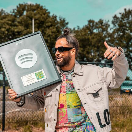 Artist with custom award frame